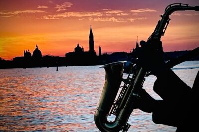 Sunset Jazz Catamaran Cruise with Aperitivo and Live Saxophone - Aperitivo and light bites: included, but manage the pace
